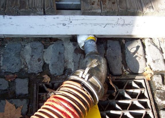 Pipe liner going in to drain at street