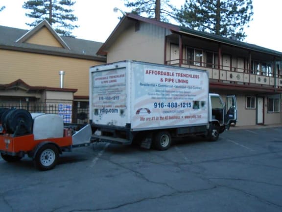 Work truck in a hotel parking lot